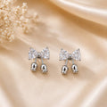 Crystal Bow Tassel Stud Earrings – 925 Silver Polish